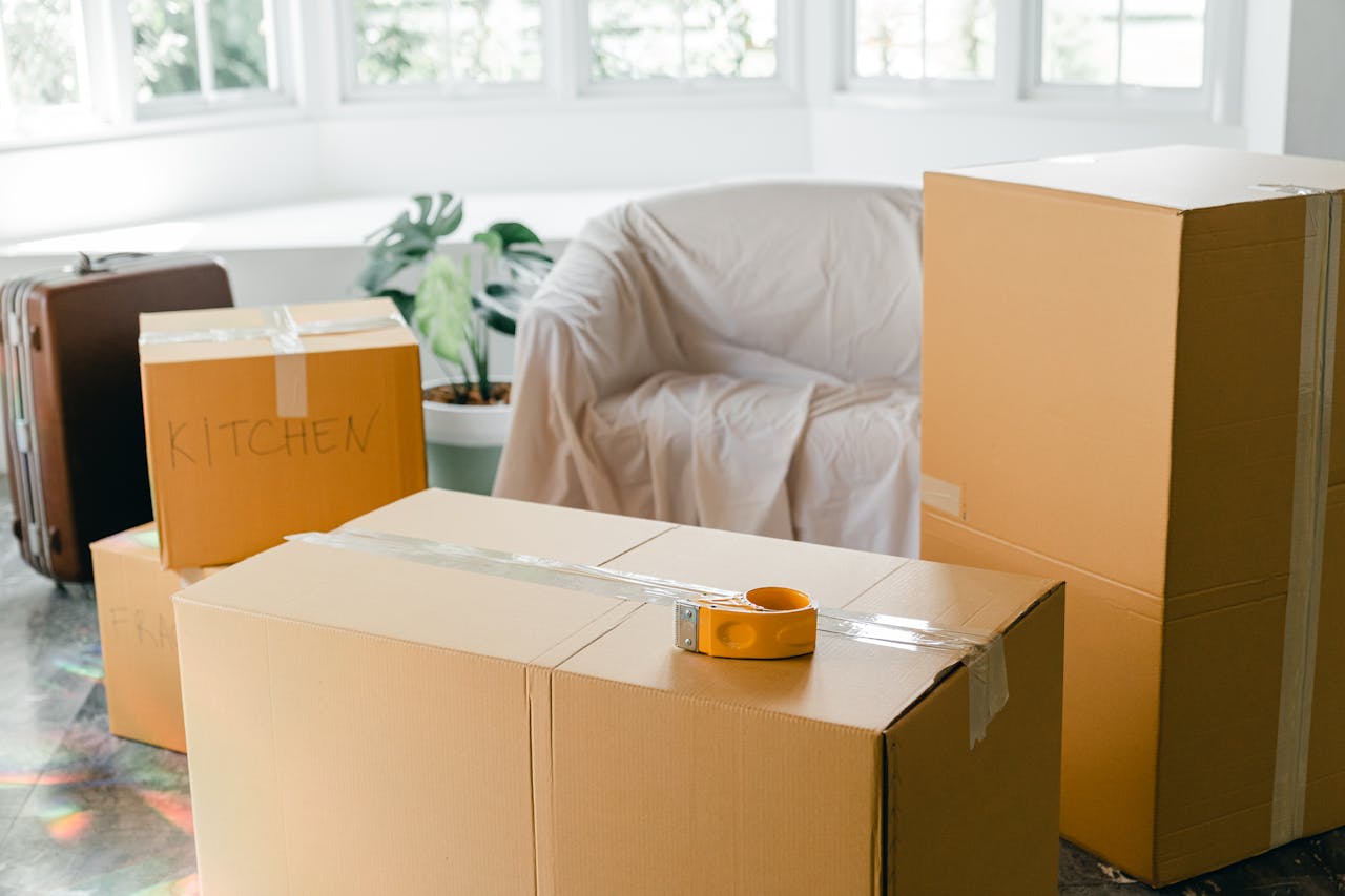 Removals team loading furniture into a van, house removals in Kingstanding, Birmingham